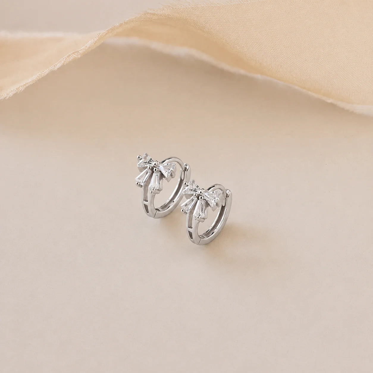Diamond Ribbon Bow Huggie Earrings