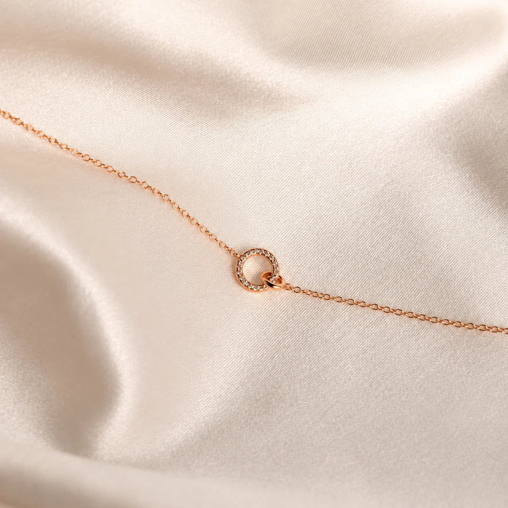 Elegant Interlocking Charm Necklace