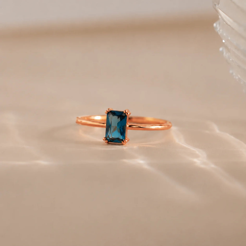 Blue Topaz Emerald Ring