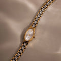 Slim Oval Timepiece in Mixed Metal Silver 18K Gold Plated