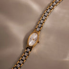 Slim Oval Timepiece in Mixed Metal Silver 18K Gold Plated