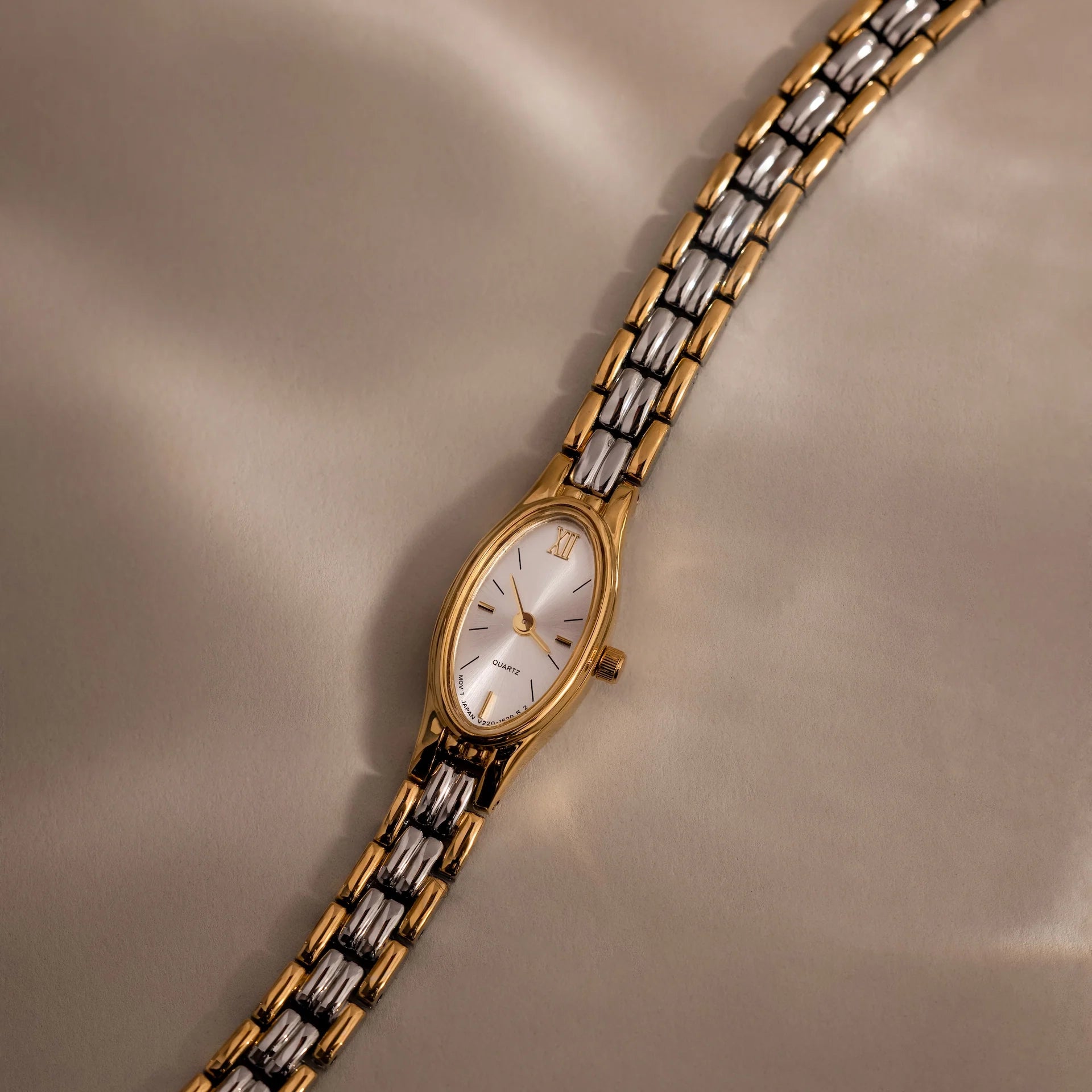 Slim Oval Timepiece in Mixed Metal Silver 18K Gold Plated