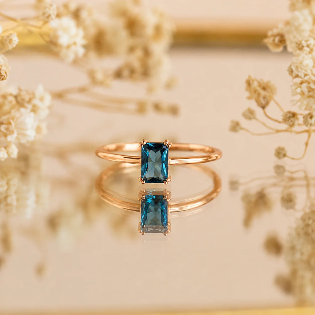 Blue Topaz Emerald Ring