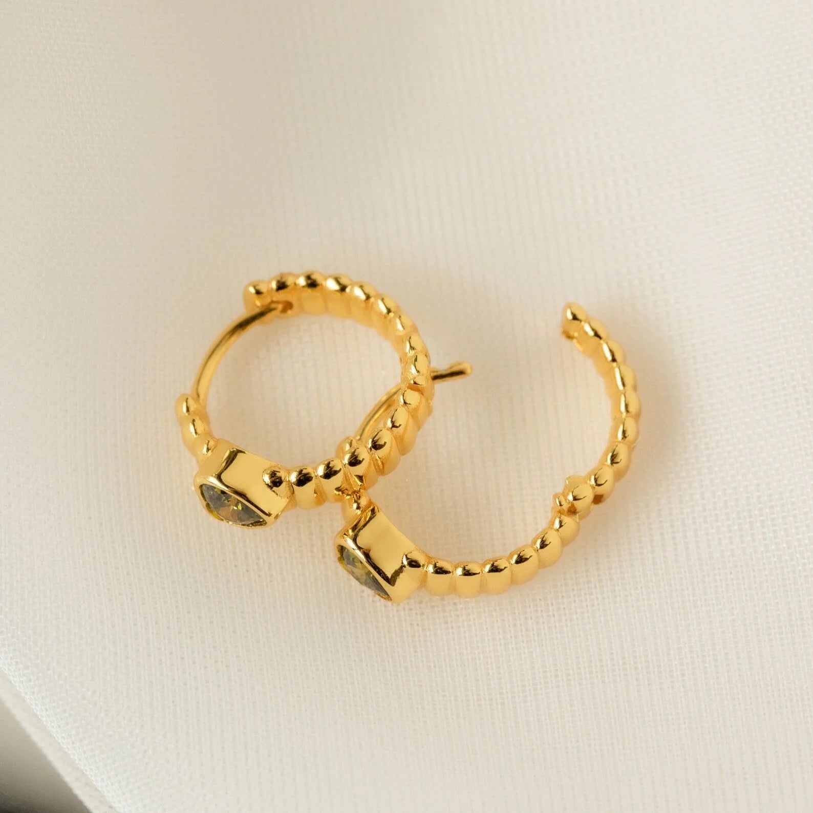 Peridot Heart Huggie Earrings