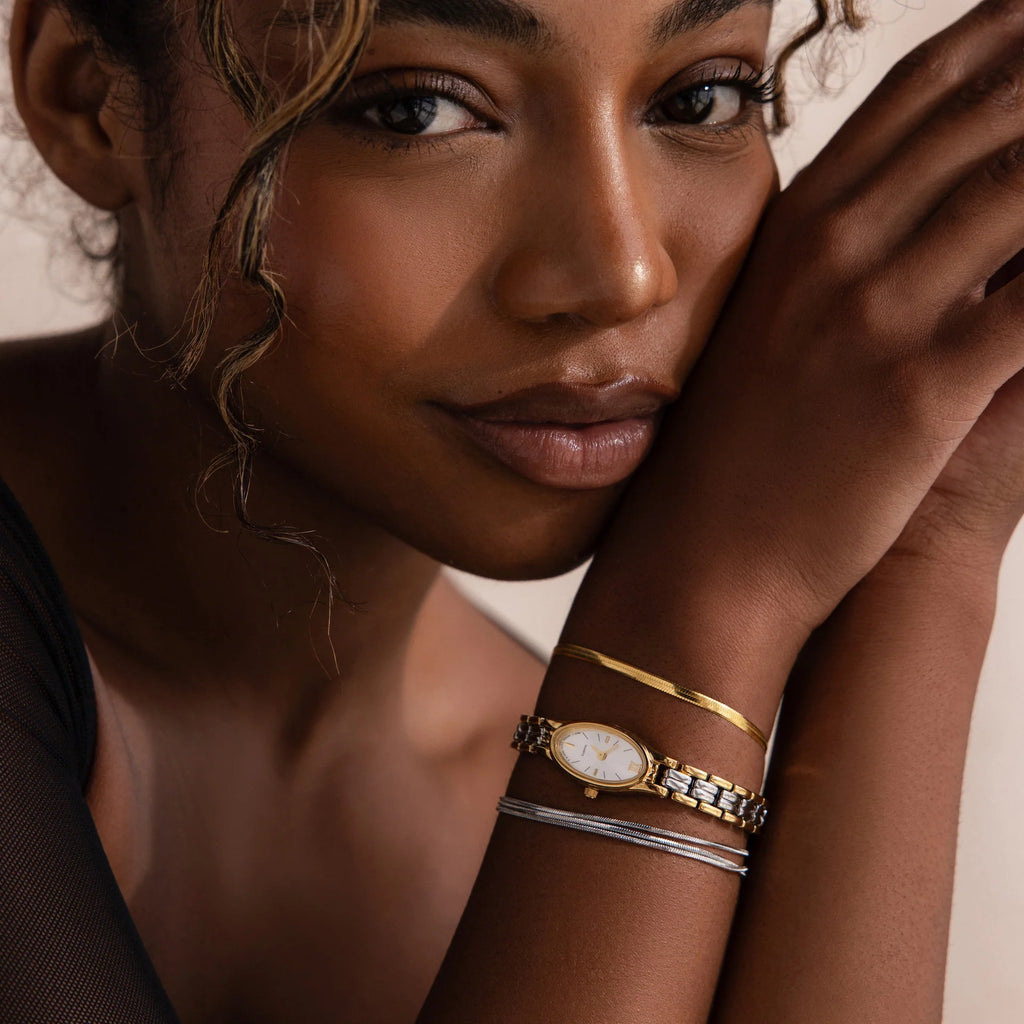 Slim Oval Timepiece in Mixed Metal Silver 18K Gold Plated