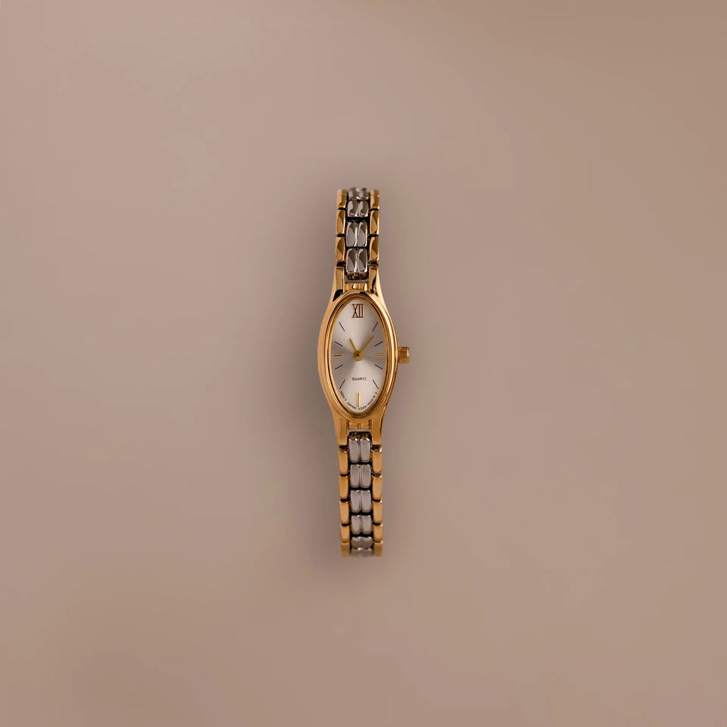 Slim Oval Timepiece in Mixed Metal Silver 18K Gold Plated