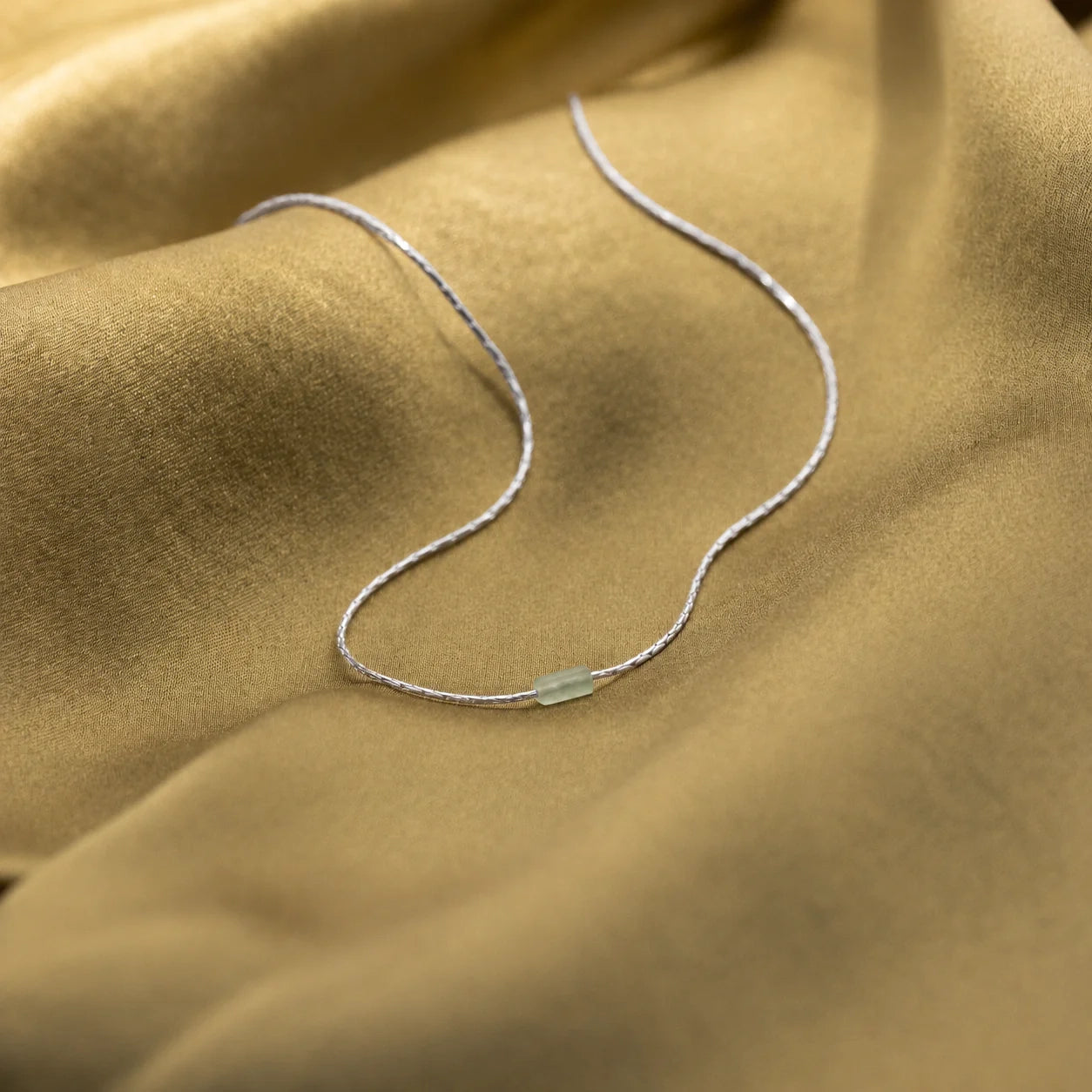 Embrace Serenity and Luck with our Green Crystal Bar Necklace