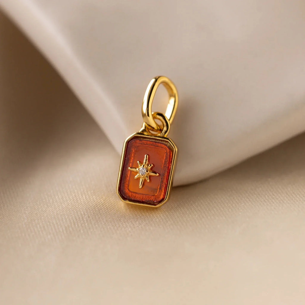 Cosmic Garnet Charm