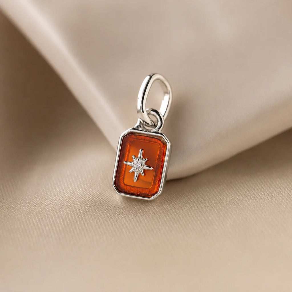 Cosmic Garnet Charm