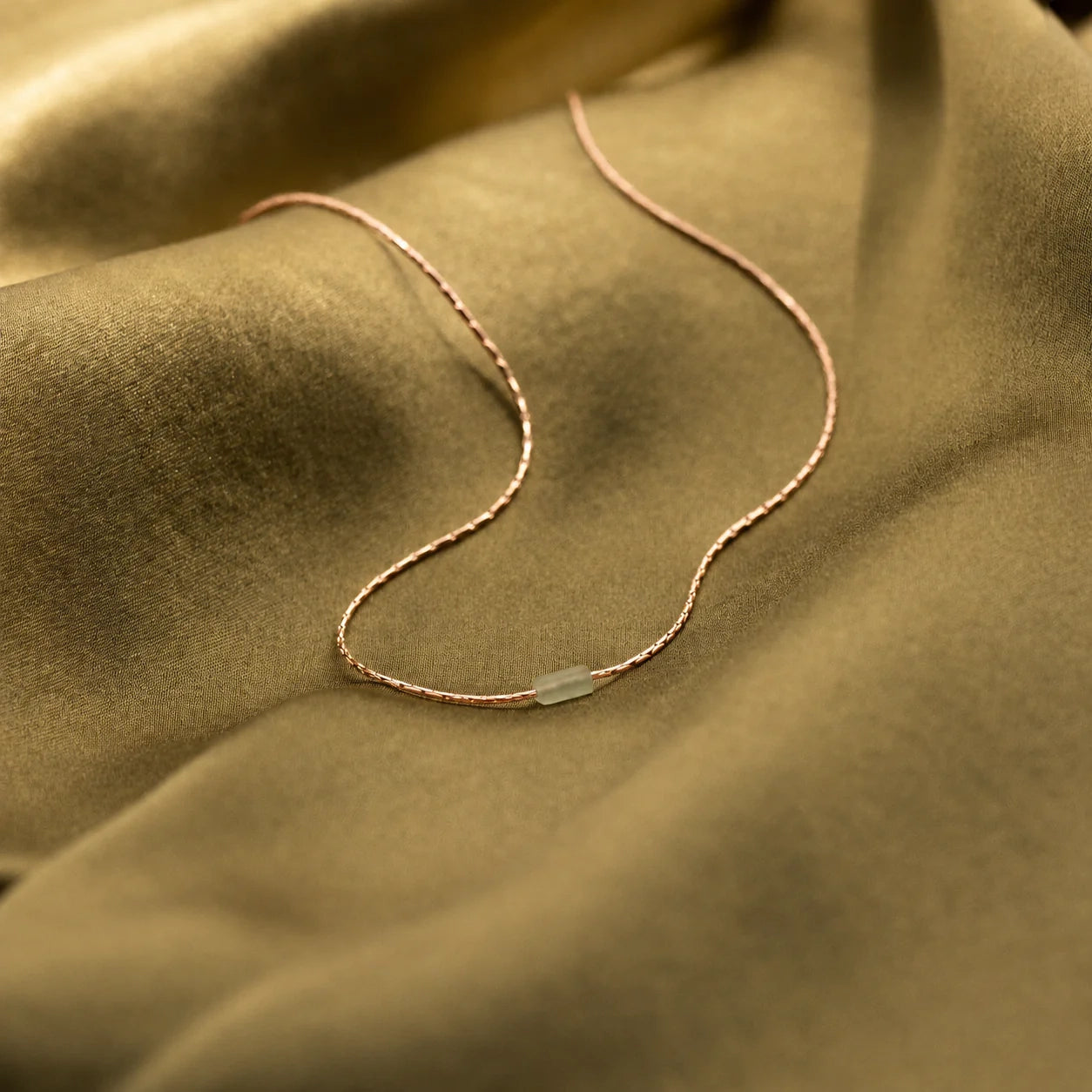 Embrace Serenity and Luck with our Green Crystal Bar Necklace